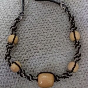 Braided hemp cord bracelet with wooden beads